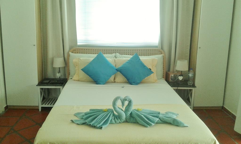 Karibu Aruba Boutique Hotel Palm Beach Rom bilde